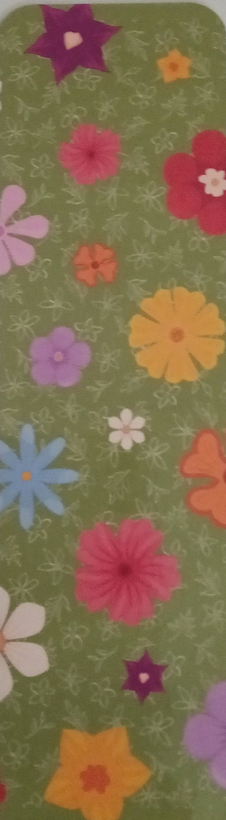 Colorful flower bookmark with a green background 